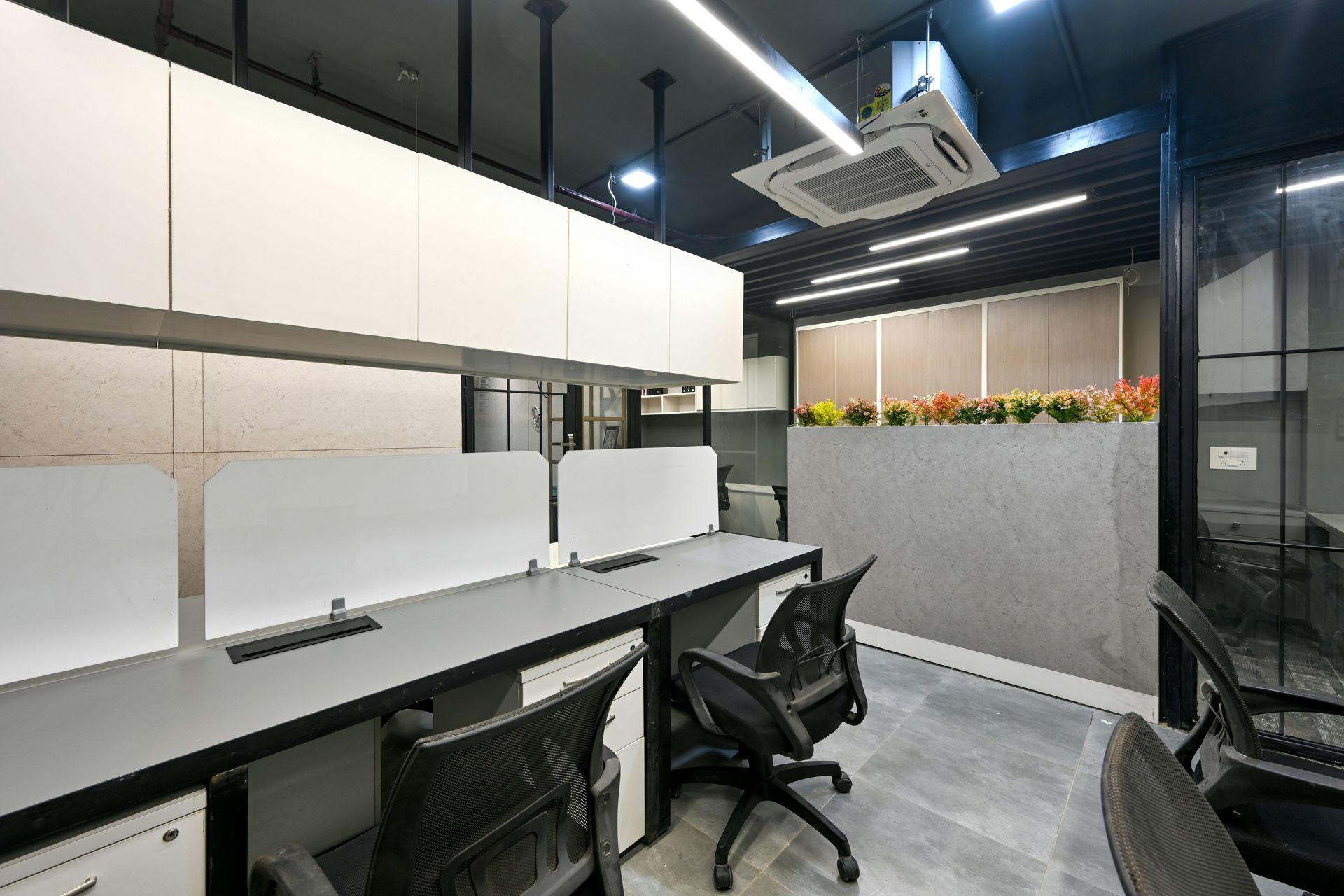 a conference room with a table and chairs